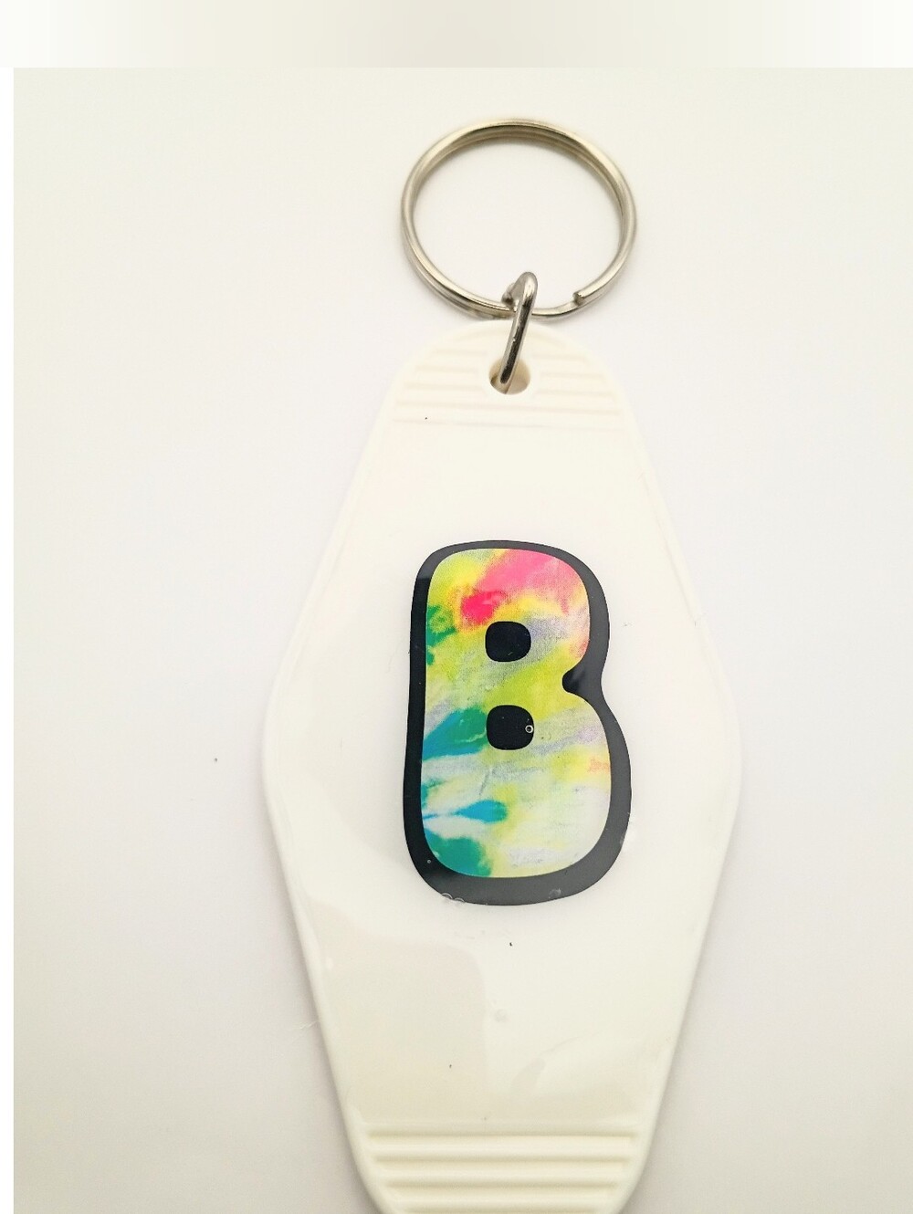 White Keychain Fob with Multicolor 'B' Accent